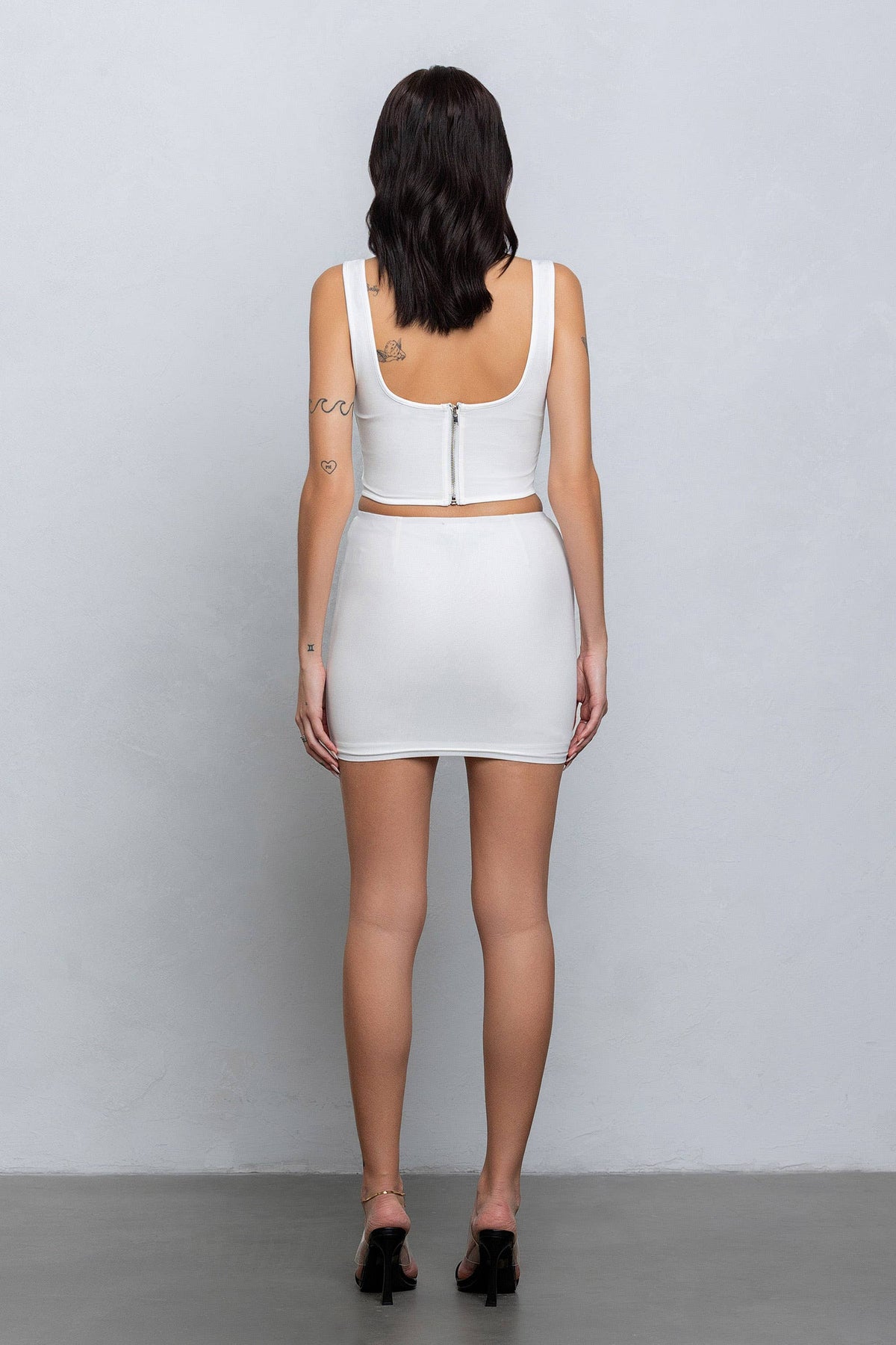Mesh bustier top and mini skirt